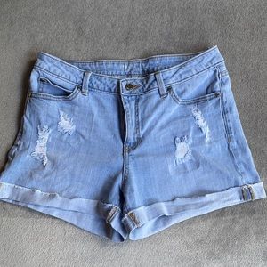 Jennifer Lopez mid rise denim shorts